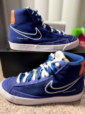 Nike Blue High-Top Sneakers with White Swoosh and Orange Heel Tab